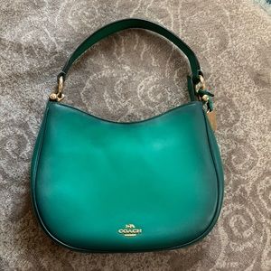 Coach Green Nomad hobo handbag.